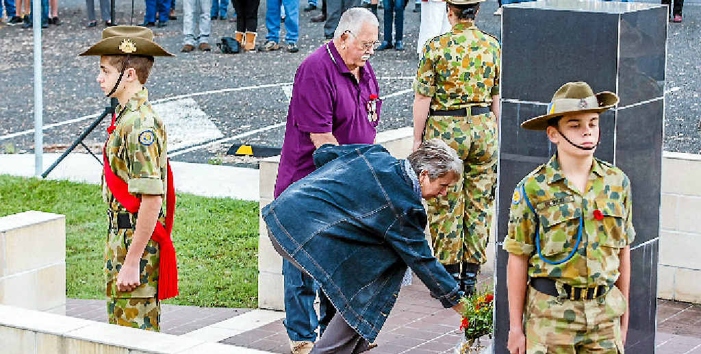 LEST WE FORGET: Nev O’Donnell, assisted by wife Kath, places a wreath on Anzac Day. LEST WE FORGET: Nev O’Donnell, assisted by wife Kath, places a wreath on Anzac Day.